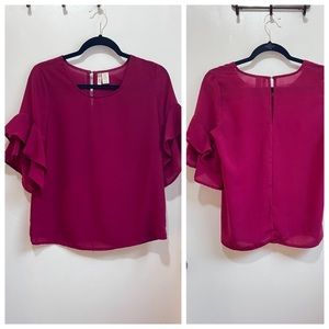 Cranberry red top in medium with flouncy sleeves